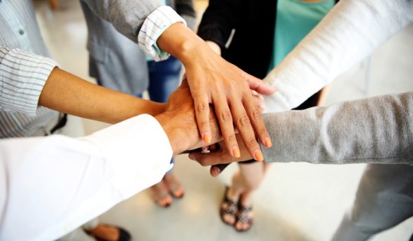 Business people joining hands