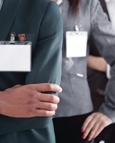 closeup.group of business people with blank badges.business concept